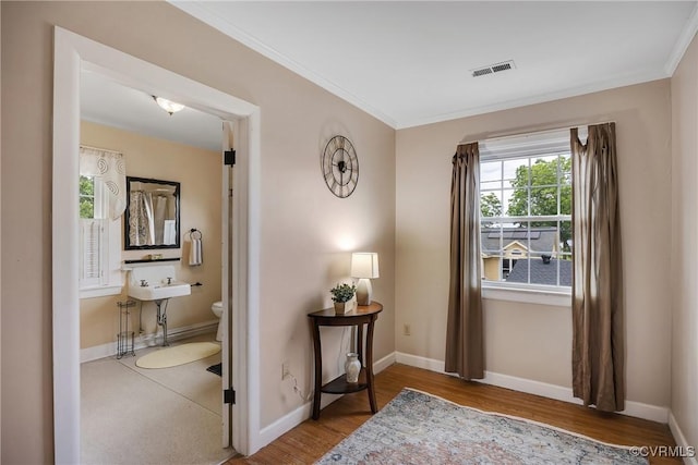 429 4th St, West Point, VA 23181 - living area with crown molding and wood finished floors