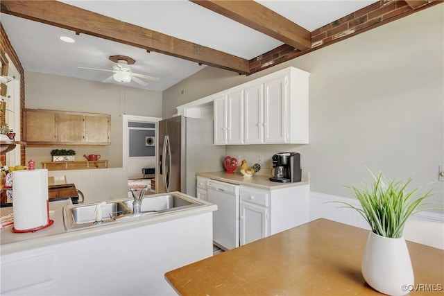 429 4th St, West Point, VA 23181 - kitchen featuring white dishwasher, ceiling fan, beamed ceiling, light countertops, and white cabinets