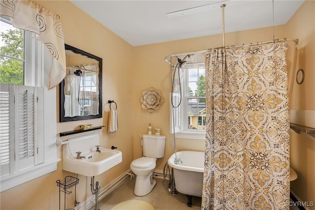 429 4th St, West Point, VA 23181 - bathroom with a freestanding tub and a shower with curtain