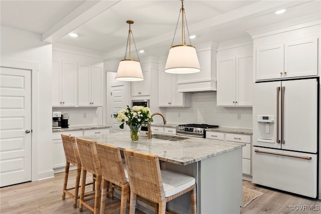 18207 Maple Summit Ct, Moseley, VA 23120 - kitchen featuring high end white refrigerator, stainless steel range with gas cooktop, light wood-type flooring, recessed lighting, and backsplash