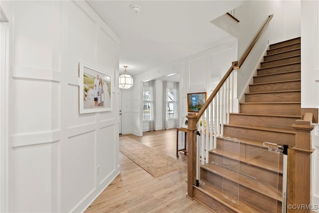 18207 Maple Summit Ct, Moseley, VA 23120 - entrance foyer with a decorative wall, stairway, and light wood-style flooring