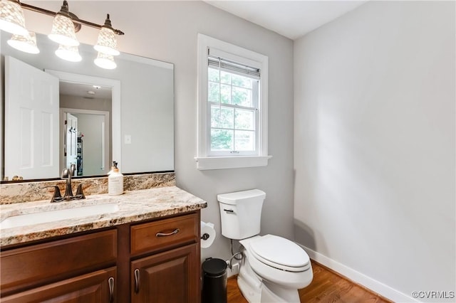 11905 Glen Gary Ct, Henrico, VA 23233 - half bath with vanity and wood finished floors