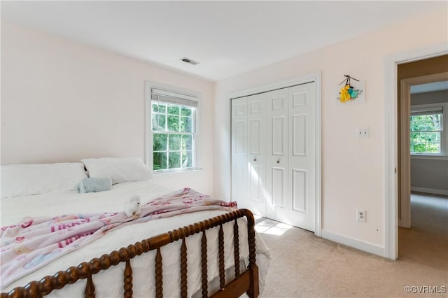 11905 Glen Gary Ct, Henrico, VA 23233 - bedroom featuring light carpet, multiple windows, and a closet