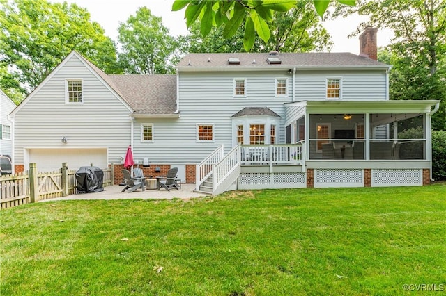 11905 Glen Gary Ct, Henrico, VA 23233 - rear view of property featuring a sunroom, a patio area, a chimney, an attached garage, and a shingled roof