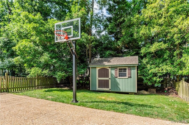 11905 Glen Gary Ct, Henrico, VA 23233 - view of shed with a fenced backyard and view of wooded area