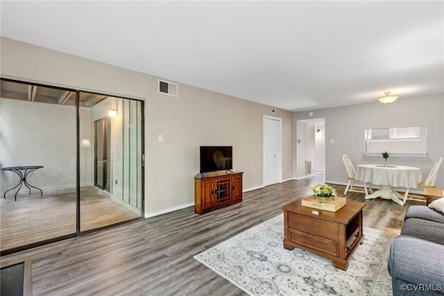 10152 Iron Mill Rd, North Chesterfield, VA 23235 - living area with wood finished floors