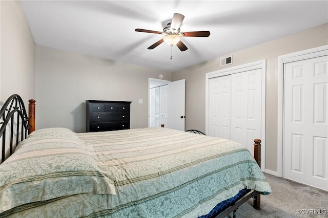 10152 Iron Mill Rd, North Chesterfield, VA 23235 - bedroom with carpet, multiple closets, and ceiling fan