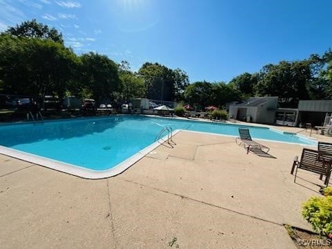 10152 Iron Mill Rd, North Chesterfield, VA 23235 - community pool featuring a patio area
