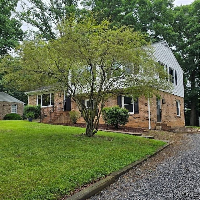 14300 Rosebud Rd, Chesterfield, VA 23838 - view of front of home featuring brick siding and a front yard