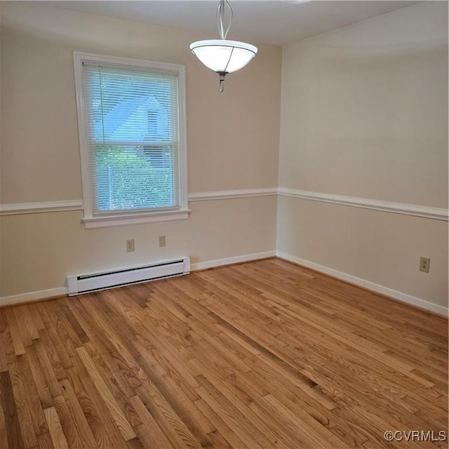 14300 Rosebud Rd, Chesterfield, VA 23838 - spare room featuring baseboard heating and wood finished floors