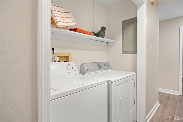 12707 Southwick Pl, Midlothian, VA 23113 - laundry area featuring independent washer and dryer, light wood-style floors, and electric panel