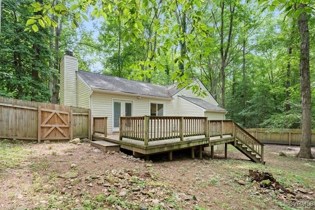 12707 Southwick Pl, Midlothian, VA 23113 - back of house with a deck, a fenced backyard, and a chimney