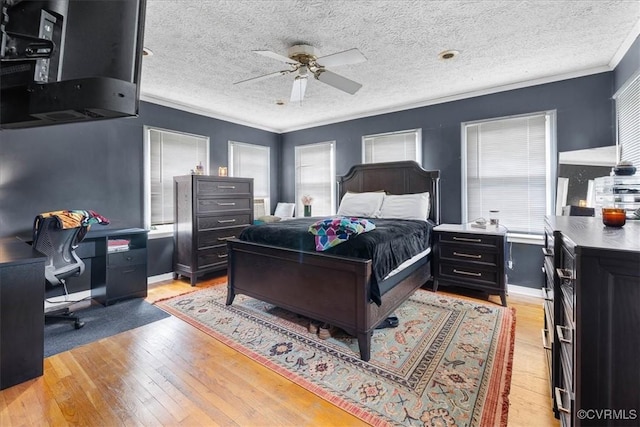 2560 Pin Oak Ct, Colonial Heights, VA 23834 - bedroom with light wood-style flooring, a desk, crown molding, a textured ceiling, and a ceiling fan