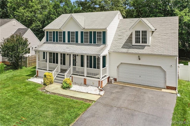 15619 Winding Ash Dr, Chesterfield, VA 23832 - view of front of home with covered porch, asphalt driveway, and a shingled roof