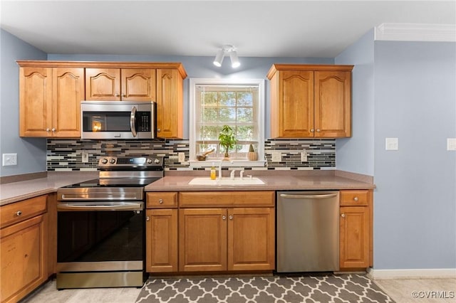 15619 Winding Ash Dr, Chesterfield, VA 23832 - kitchen with stainless steel appliances, tasteful backsplash, and light countertops