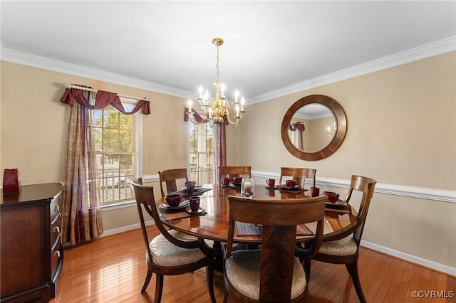 15619 Winding Ash Dr, Chesterfield, VA 23832 - dining space featuring a chandelier, light wood-style flooring, and crown molding