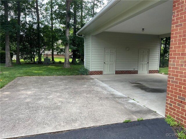 8426 Forge Rd, Henrico, VA 23228 - view of patio / terrace featuring concrete driveway