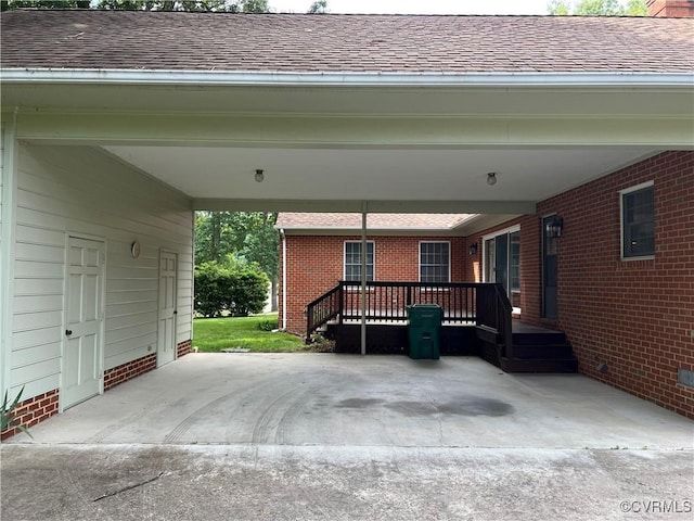 8426 Forge Rd, Henrico, VA 23228 - view of patio / terrace featuring an attached carport and driveway