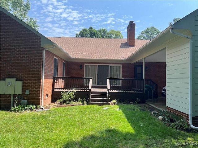 8426 Forge Rd, Henrico, VA 23228 - back of property with a wooden deck, a chimney, a lawn, and brick siding