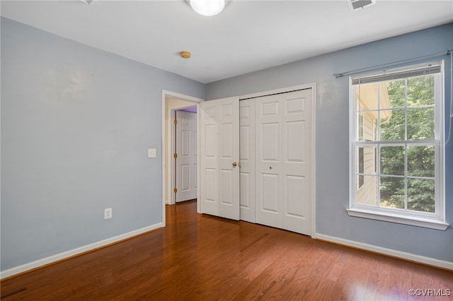 419 Carter Ln, Louisa, VA 23093 - unfurnished bedroom featuring wood finished floors and a closet