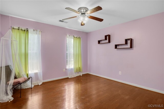 419 Carter Ln, Louisa, VA 23093 - spare room with wood finished floors and ceiling fan