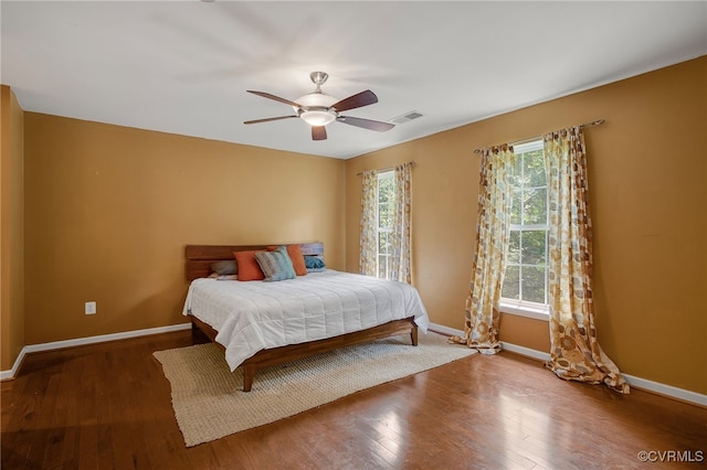 419 Carter Ln, Louisa, VA 23093 - bedroom with multiple windows, hardwood / wood-style flooring, and ceiling fan