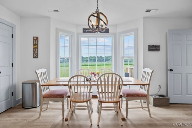 9530 Dabneys Mill Rd, Manquin, VA 23106 - dining space with a chandelier, light wood-style flooring, and plenty of natural light