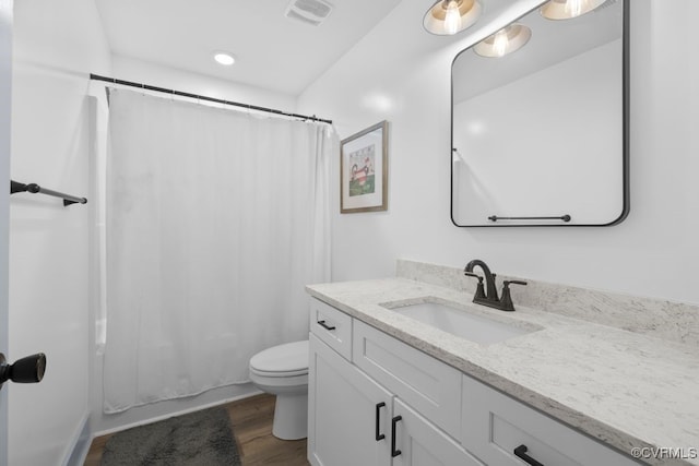 9530 Dabneys Mill Rd, Manquin, VA 23106 - bathroom featuring vanity, wood finished floors, and shower / bath combo