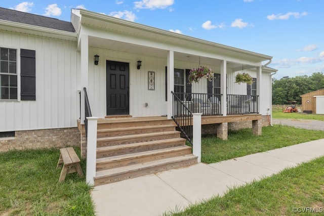 9530 Dabneys Mill Rd, Manquin, VA 23106 - property entrance with crawl space, a porch, and roof with shingles