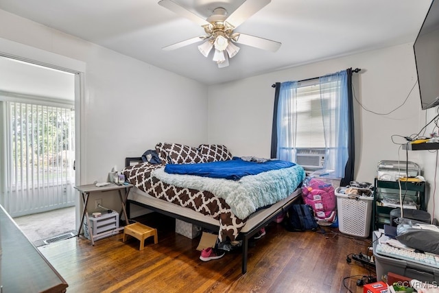 4825 Stanley Dr, North Chesterfield, VA 23234 - bedroom with multiple windows, wood-type flooring, and a ceiling fan