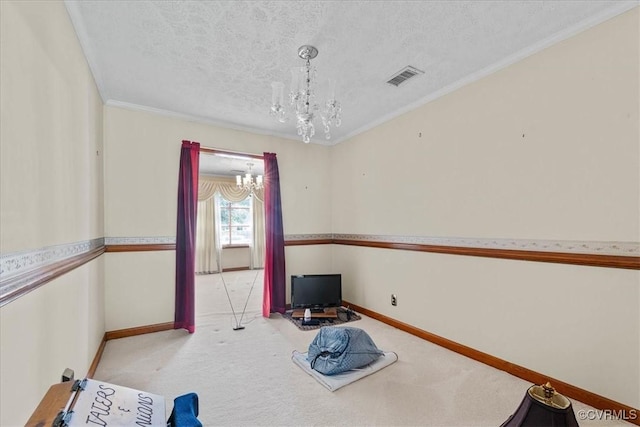 708 Compton Rd, Colonial Heights, VA 23834 - spare room with a chandelier, a textured ceiling, light colored carpet, and crown molding