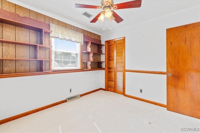 708 Compton Rd, Colonial Heights, VA 23834 - unfurnished room with carpet, a ceiling fan, and ornamental molding
