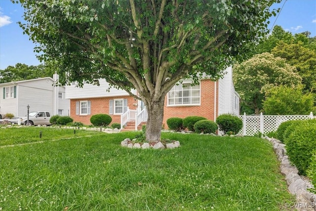 708 Compton Rd, Colonial Heights, VA 23834 - obstructed view of property with brick siding