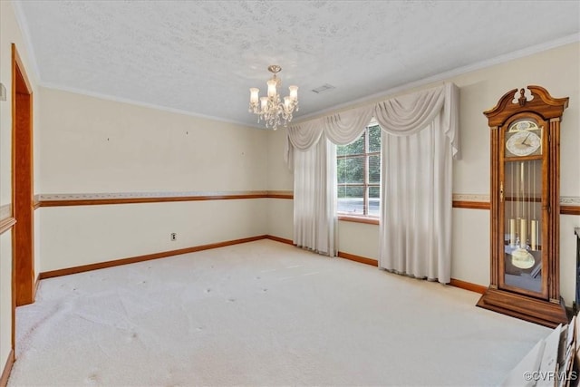 708 Compton Rd, Colonial Heights, VA 23834 - spare room with a chandelier, carpet flooring, ornamental molding, and a textured ceiling