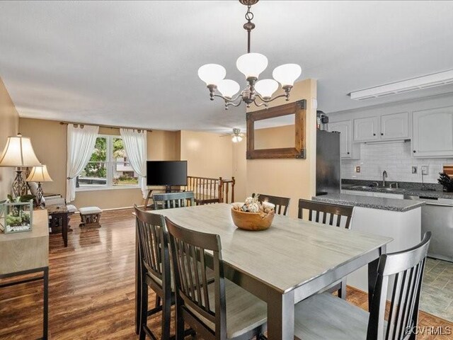 8507 Spruce Pine Dr, North Chesterfield, VA 23235 - dining area featuring a chandelier, wood finished floors, and ceiling fan