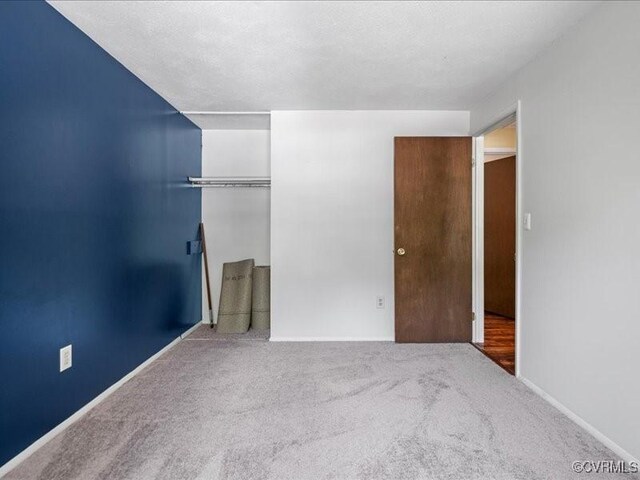 8507 Spruce Pine Dr, North Chesterfield, VA 23235 - unfurnished bedroom with a closet and carpet floors