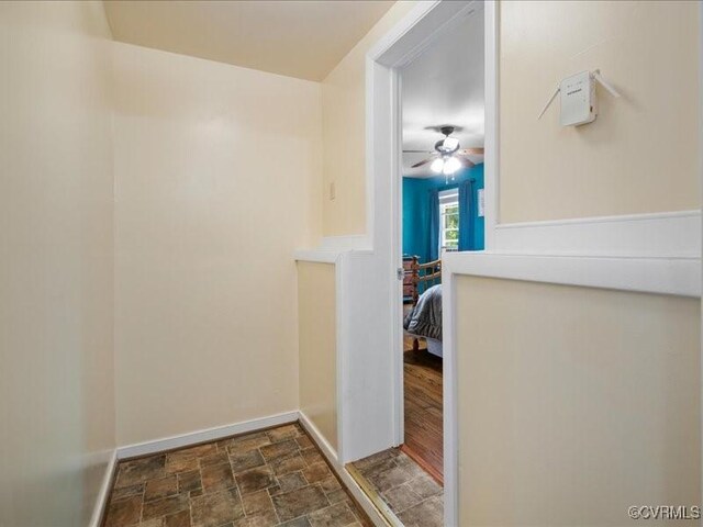 8507 Spruce Pine Dr, North Chesterfield, VA 23235 - hallway featuring stone finish flooring and baseboards