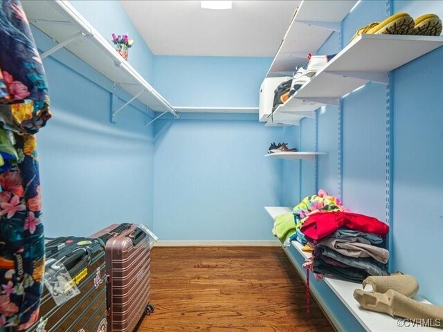 8507 Spruce Pine Dr, North Chesterfield, VA 23235 - walk in closet with wood finished floors