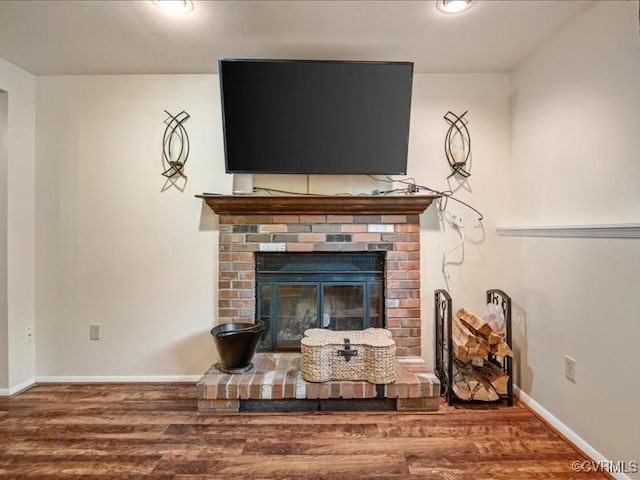 8507 Spruce Pine Dr, North Chesterfield, VA 23235 - detailed view of wood finished floors and a brick fireplace