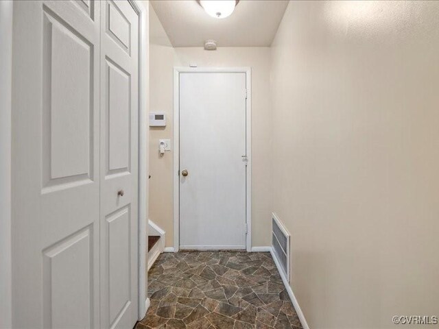 8507 Spruce Pine Dr, North Chesterfield, VA 23235 - entryway with dark stone finish floors and baseboards