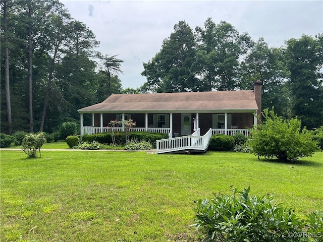 17800 Fraher Ln, Amelia Courthouse, VA 23002 - ranch-style house with covered porch, a chimney, and a front lawn