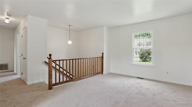 831 Winnetka Ave, Henrico, VA 23227 - carpeted empty room with baseboards