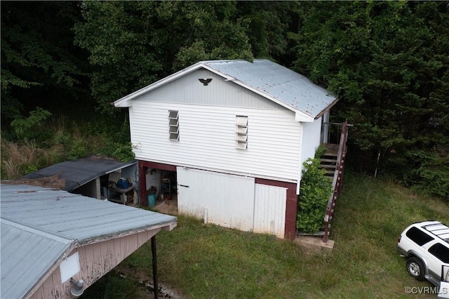 549 Ararat Hwy, Patrick Springs, VA 24053 - view of outbuilding with a forest view and stairway