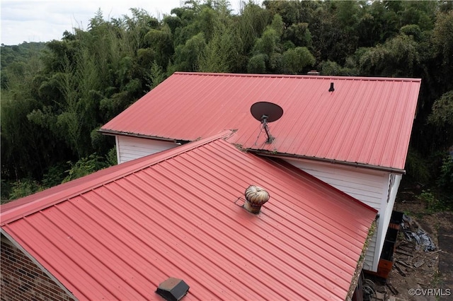 549 Ararat Hwy, Patrick Springs, VA 24053 - exterior view of a metal roof and a satellite dish