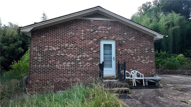 549 Ararat Hwy, Patrick Springs, VA 24053 - back of property with brick siding and a patio area