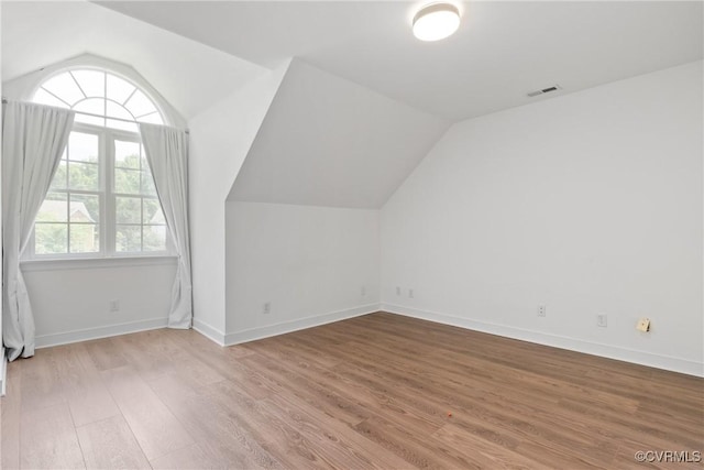 9563 Plateau Pl, Mechanicsville, VA 23116 - bonus room featuring lofted ceiling and wood finished floors