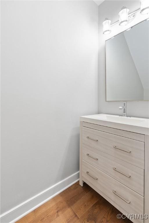 9563 Plateau Pl, Mechanicsville, VA 23116 - bathroom with wood finished floors and vanity