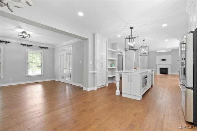 9563 Plateau Pl, Mechanicsville, VA 23116 - kitchen featuring high end fridge, open shelves, open floor plan, white cabinets, and light countertops