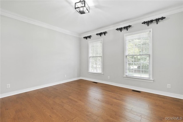 9563 Plateau Pl, Mechanicsville, VA 23116 - spare room featuring crown molding and wood-type flooring