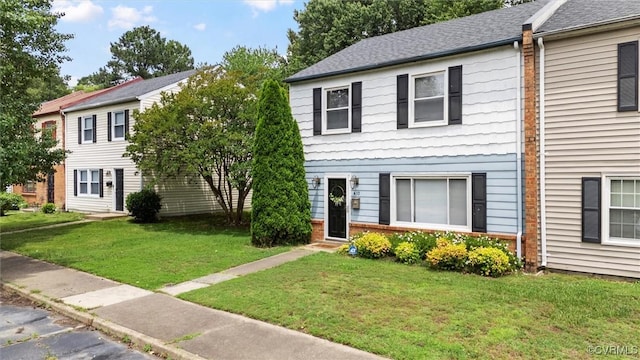 410 Airycrest Dr, Highland Springs, VA 23075 - view of front facade featuring brick siding, a front yard, and entry steps